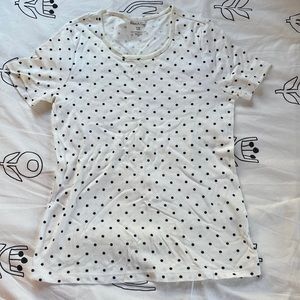 White tshirt with blue polka dots
